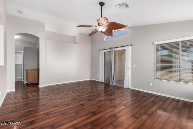 spare room featuring ceiling fan, lofted ceiling, and dark hardwood / wood-style flooring