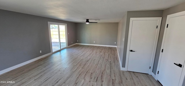 spare room featuring light hardwood / wood-style flooring