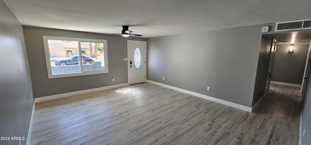 entrance foyer featuring ceiling fan and light hardwood / wood-style flooring