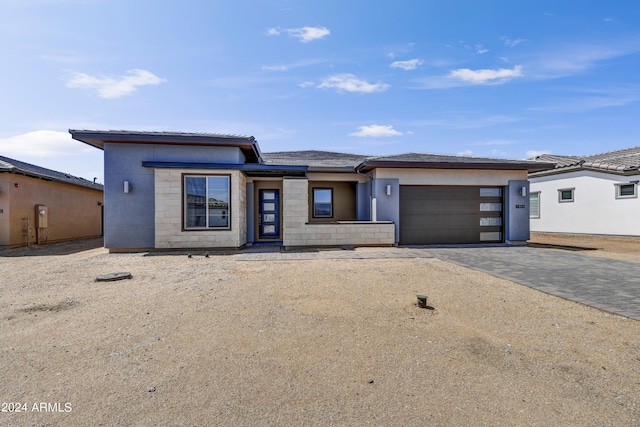 18203 E Paria Canyon Dr, Rio Verde, AZ 85263 - prairie-style home featuring driveway, an attached garage, and stucco siding