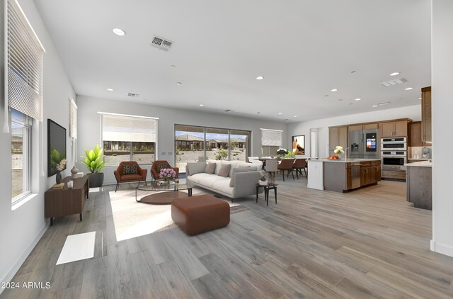 18203 E Paria Canyon Dr, Rio Verde, AZ 85263 - living area featuring light wood-type flooring, recessed lighting, and baseboards