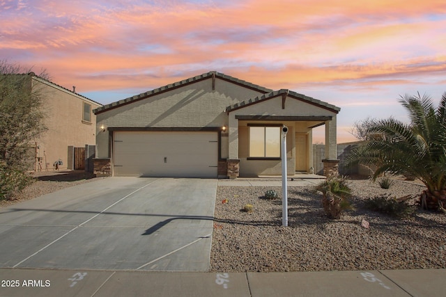 view of front of home with a garage