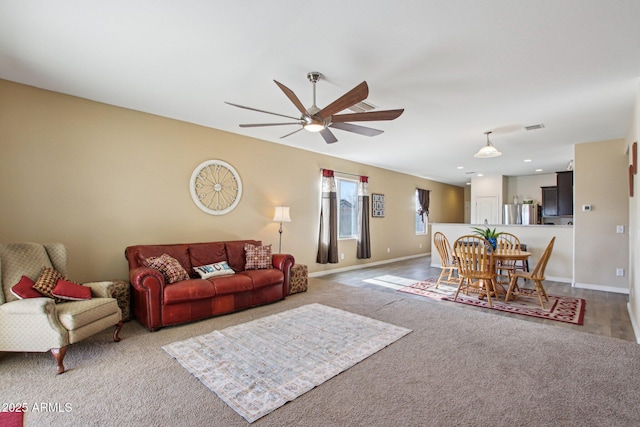 living room with ceiling fan