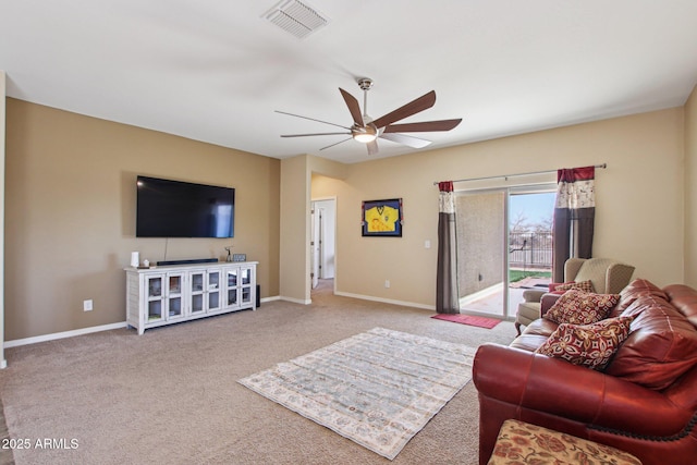 living room featuring light carpet and ceiling fan