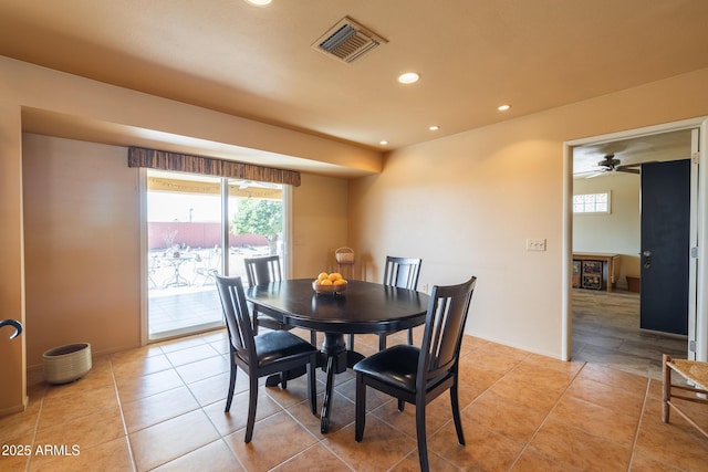 dining room with light tile patterned floors, visible vents, and recessed lighting