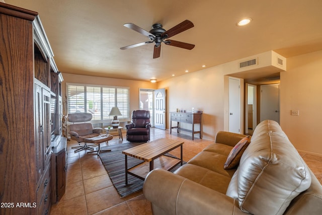 living area with light tile patterned floors, ceiling fan, visible vents, and recessed lighting