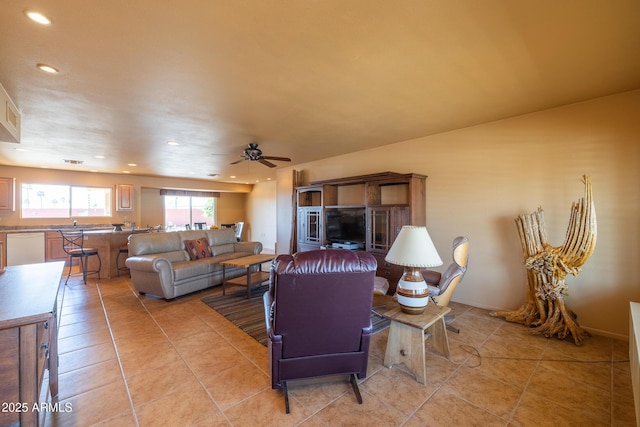 living room with light tile patterned floors, ceiling fan, and recessed lighting