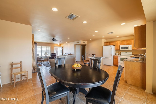 dining area with light tile patterned floors, ceiling fan, visible vents, and recessed lighting