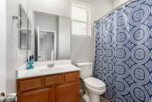 full bath with vanity and toilet