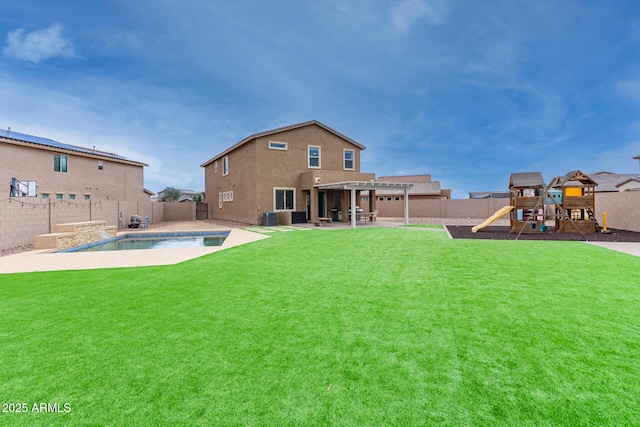 rear view of house featuring a yard, a fenced backyard, a pergola, a playground, and a patio area