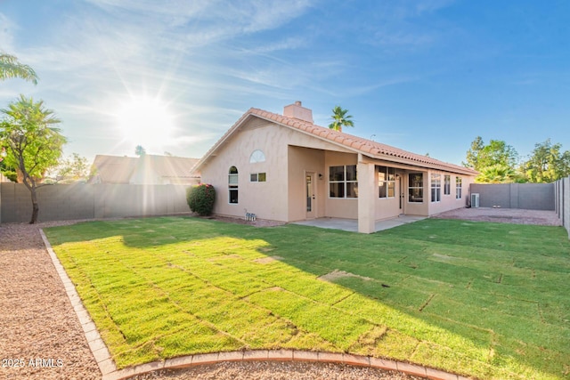 1627 W Maplewood St, Chandler, AZ 85286 - rear view of property with a chimney, a patio area, stucco siding, and central AC unit