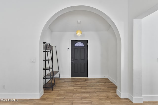 4632 E Kachina Trl, Phoenix, AZ 85044 - entrance foyer featuring wood finished floors, baseboards, and arched walkways