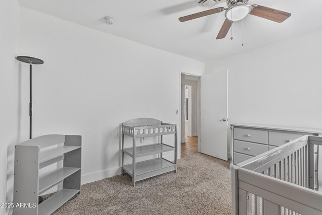 4632 E Kachina Trl, Phoenix, AZ 85044 - carpeted bedroom featuring baseboards and a ceiling fan