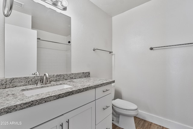 4632 E Kachina Trl, Phoenix, AZ 85044 - full bathroom with wood finished floors, toilet, a shower, and vanity