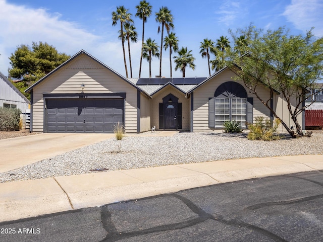 4632 E Kachina Trl, Phoenix, AZ 85044 - ranch-style home featuring a garage, driveway, and solar panels