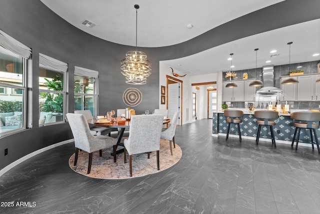 dining area with baseboards, recessed lighting, visible vents, and an inviting chandelier