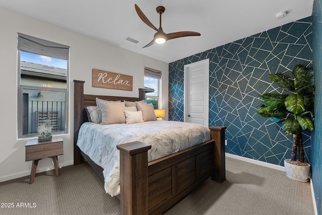 bedroom with carpet, visible vents, baseboards, and wallpapered walls