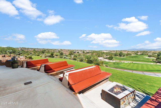 3254 Buckaroo Ct, Wickenburg, AZ 85390 - view of patio / terrace featuring an outdoor living space with a fire pit, a mountain view, and golf course view
