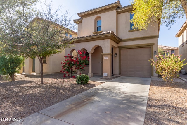 view of front of property featuring a garage