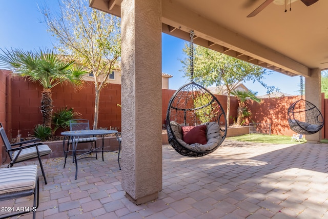 view of patio with ceiling fan