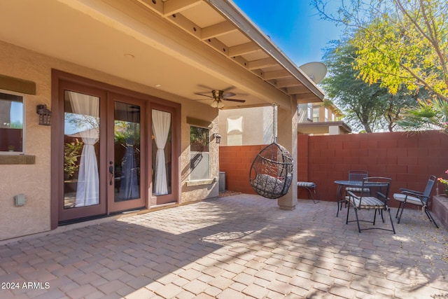 view of patio featuring ceiling fan