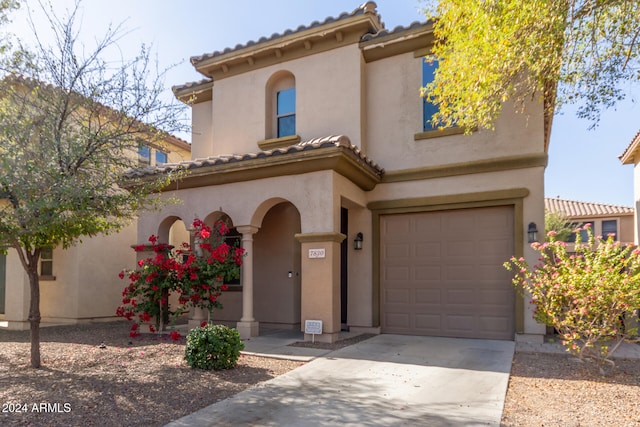 view of front of house with a garage