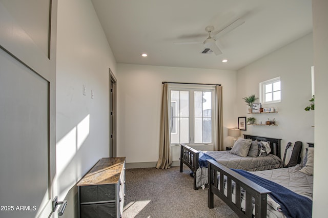 carpeted bedroom featuring ceiling fan