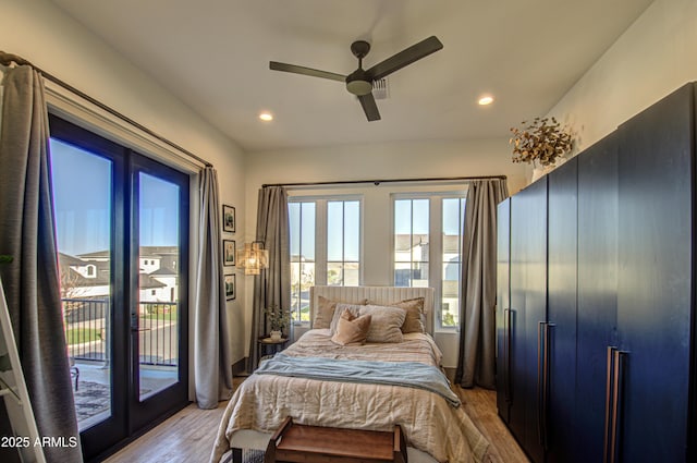 bedroom with ceiling fan, access to outside, and light wood-type flooring