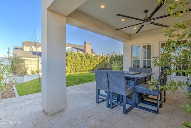 view of patio / terrace featuring ceiling fan