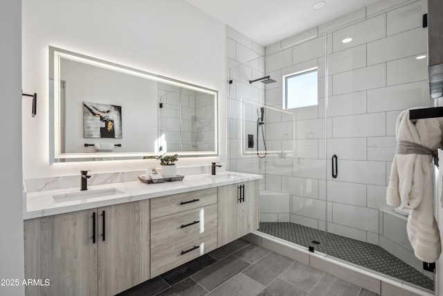 bathroom featuring tile patterned floors, vanity, and an enclosed shower