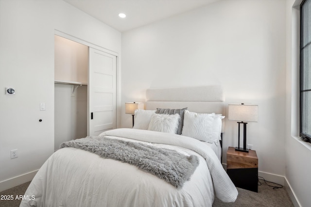 carpeted bedroom with a closet