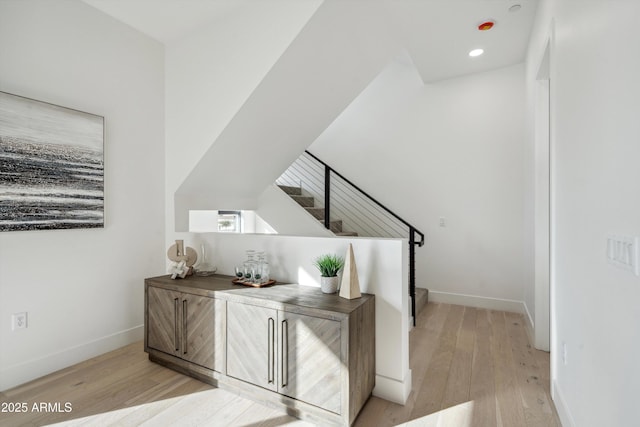 stairs with wood-type flooring