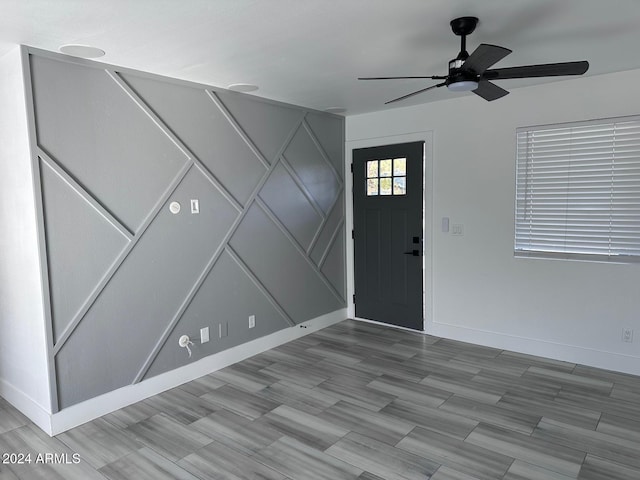 entryway featuring ceiling fan