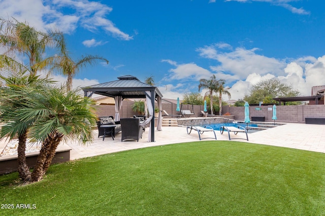 view of pool with a gazebo, a yard, and a patio area