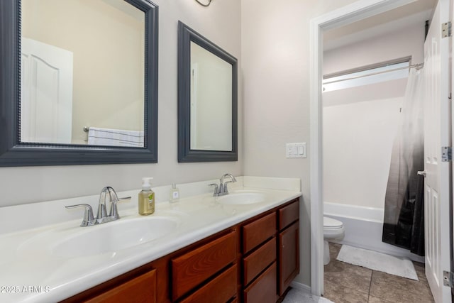 full bathroom featuring tile patterned flooring, vanity, shower / tub combo, and toilet