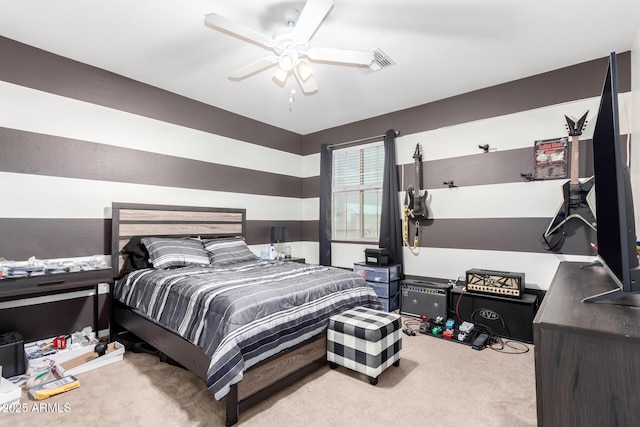 bedroom featuring light colored carpet and ceiling fan