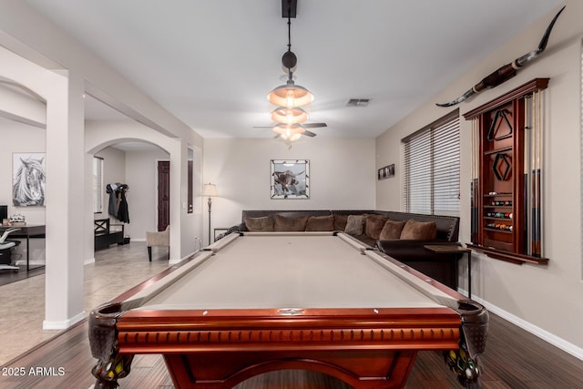 rec room featuring hardwood / wood-style floors and ceiling fan