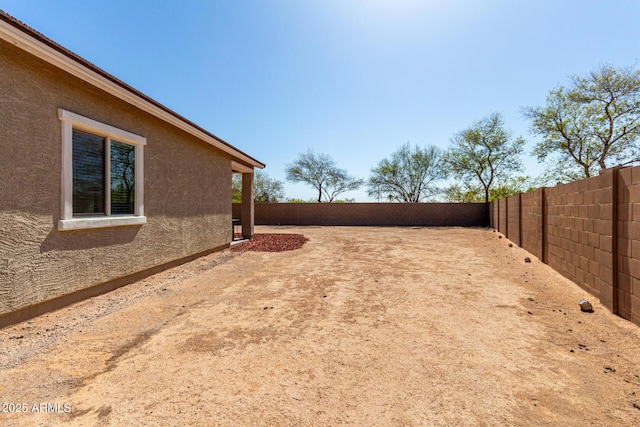 view of yard featuring a fenced backyard