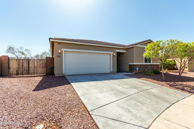 ranch-style house with driveway, stucco siding, a garage, stone siding, and a tiled roof