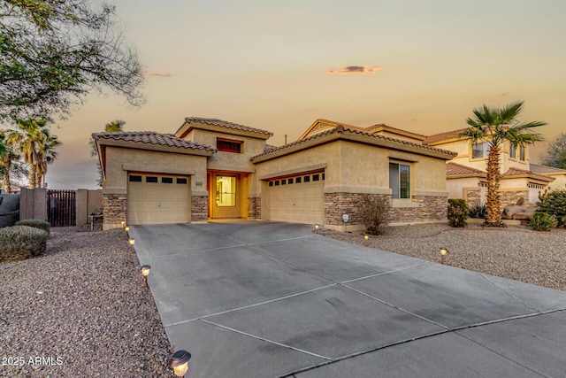 mediterranean / spanish-style home featuring a garage