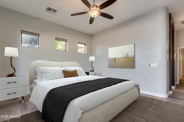 bedroom featuring wood-type flooring and ceiling fan