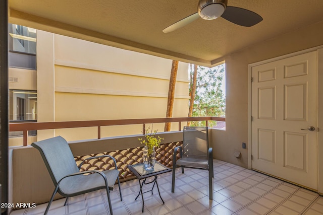 balcony featuring ceiling fan