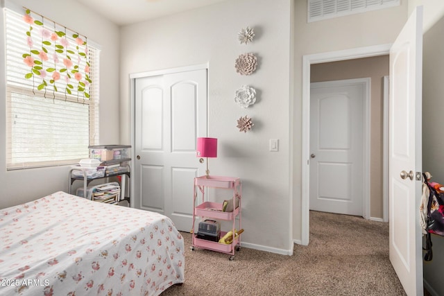 4556 E Gagarinite Ln, San Tan Valley, AZ 85143 - carpeted bedroom featuring a closet, baseboards, and visible vents