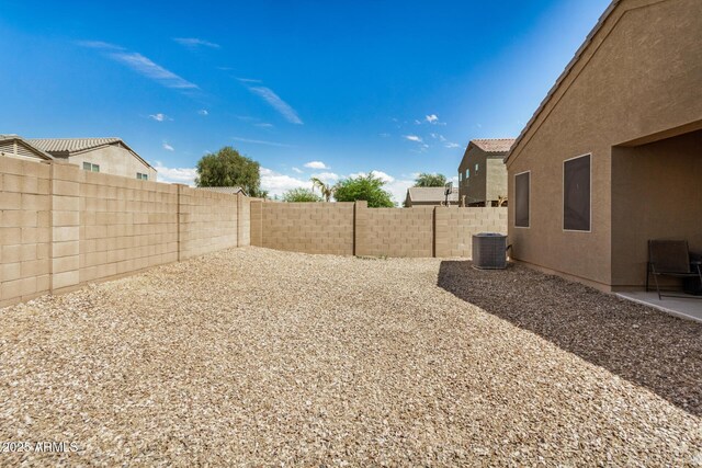 4556 E Gagarinite Ln, San Tan Valley, AZ 85143 - view of yard featuring a patio area, a fenced backyard, and cooling unit
