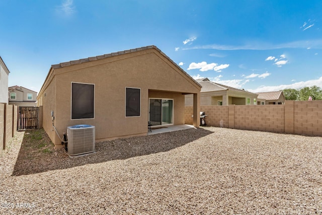 4556 E Gagarinite Ln, San Tan Valley, AZ 85143 - back of house with central AC unit, a fenced backyard, a patio, and stucco siding