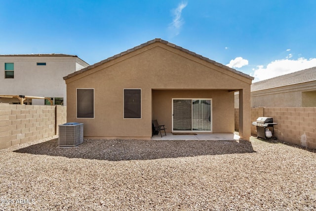 4556 E Gagarinite Ln, San Tan Valley, AZ 85143 - back of property with a patio, stucco siding, fence, and central AC unit