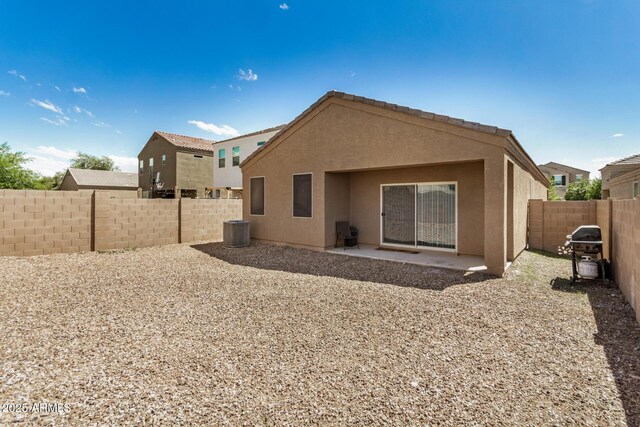 4556 E Gagarinite Ln, San Tan Valley, AZ 85143 - rear view of property with a patio, a fenced backyard, stucco siding, and central AC unit