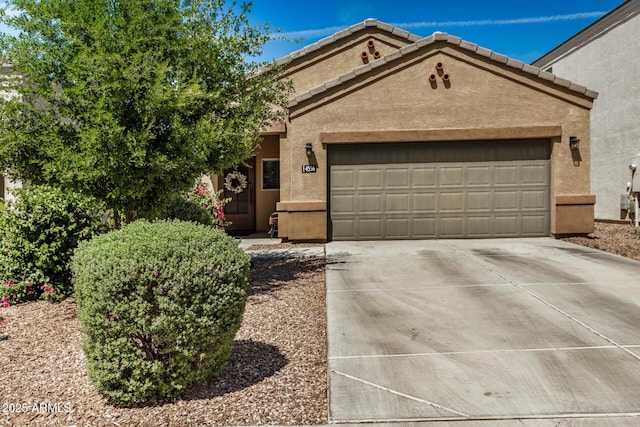 4556 E Gagarinite Ln, San Tan Valley, AZ 85143 - view of front of home featuring concrete driveway, an attached garage, and stucco siding