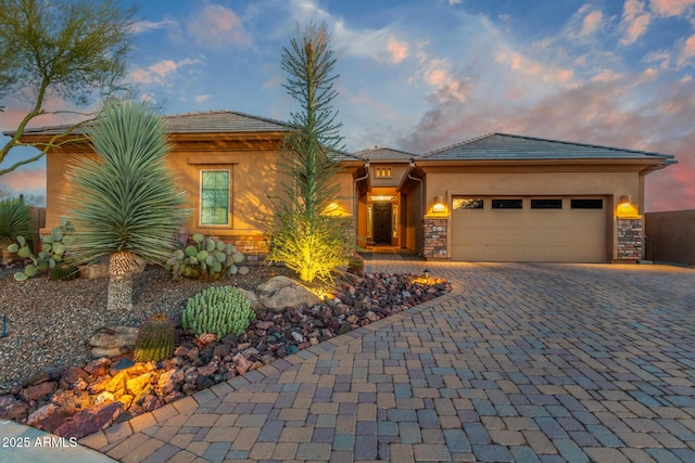 view of front of home featuring a garage