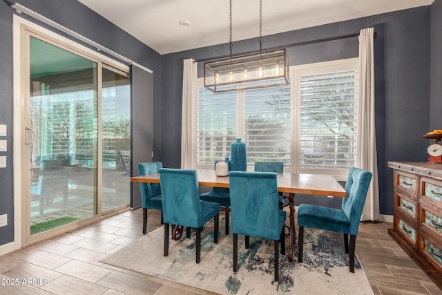 dining room featuring a wealth of natural light